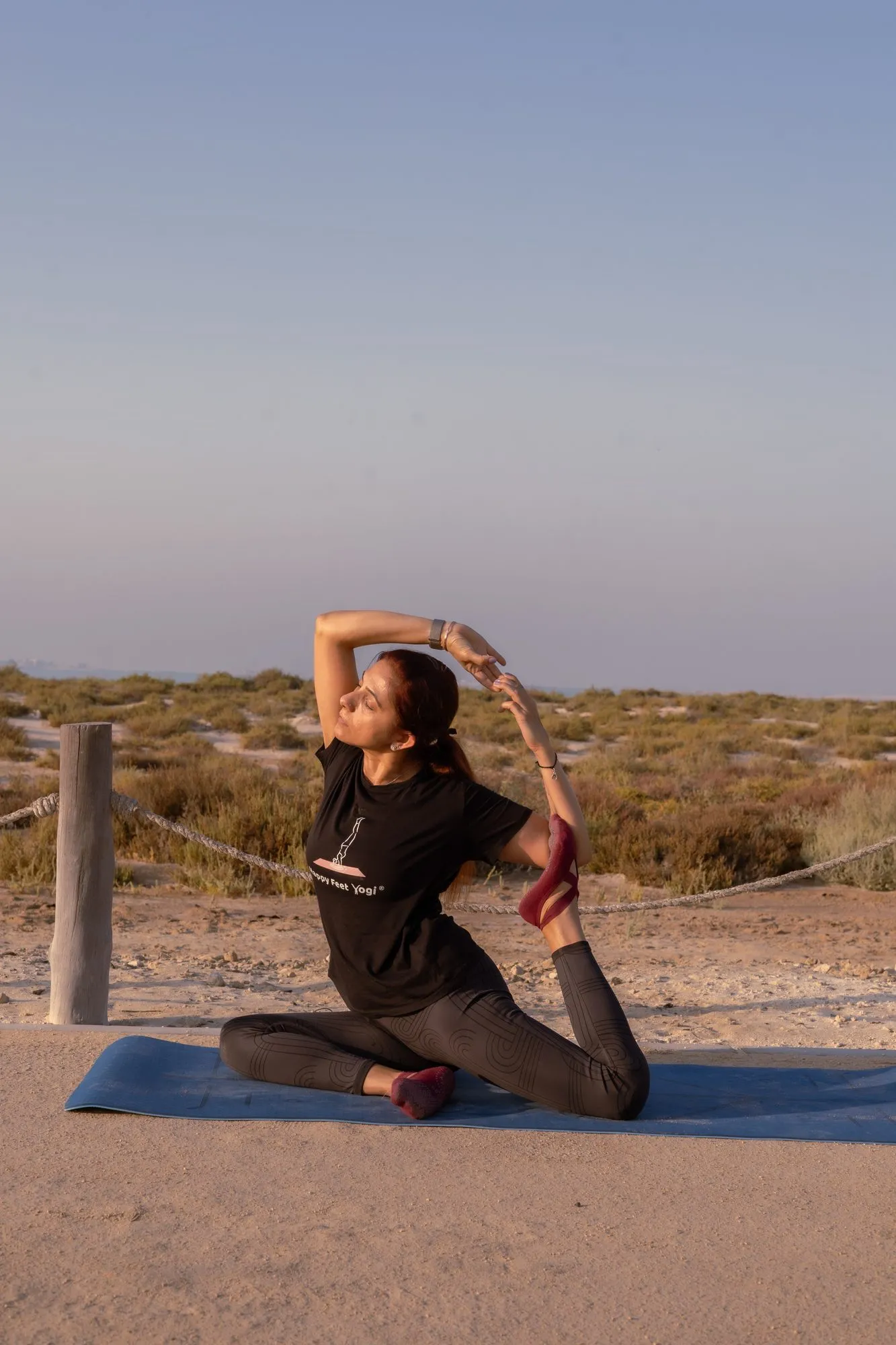Brinda practising at sunrise on the beach in Abu Dhabi
